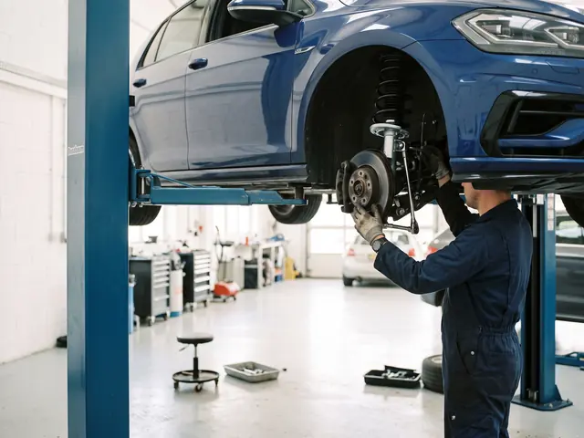 New suspension strut being fitted